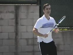 CU a male tennis player hitting the tennis ball forehand and backhand. Stock Footage