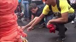 CLEAN : Protesters burn mock World Cup trophy in Brasilia News Clip