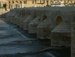 TU LS from Guadlqivir river to Roman bridge and Cathedral-Mosque Stock Footage