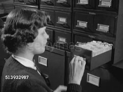 1952: CARDS ON FILE: TD Angled MS Card catalog files stacked on top of rows of file cabinets, young adult female opening card file, taking out batch of handwritten index cards, closing file & leaving.  Filing clerk, secretary, assistant Instructional Video