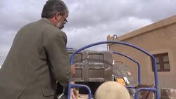 CLEAN : In Raqa countryside civilians gather empty ammunition boxes News Clip