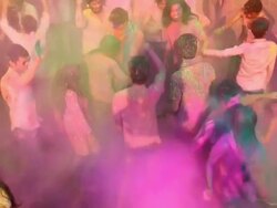 Group of people playing holi and dancing, Delhi, India Stock Footage