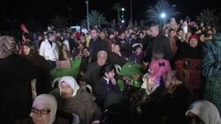 Palestinian President Abbas presides over mass wedding of 218 couples in hotel car park News Clip