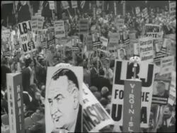 A man standing at a podium nominates Lyndon B. Johnson for U. S. President at the 1960 Democratic National Convention. News Clip