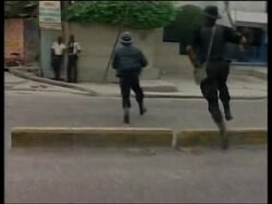 Police use tear gas to break up anti government protest Instructional Video