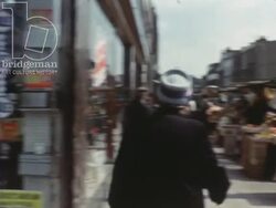 Somewhere Decent to Live 1967 part 1 - cityscape GVs of London, woman looking for property Stock Footage