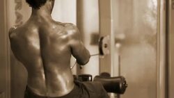 Body Builder Performing Middle Back Exercise in the Gym Stock Footage