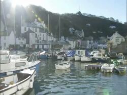 Large collection of boats moored in harbour, UK; 2006; short sequence. Stock Footage