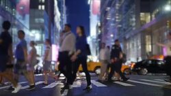 business people commuting on crowded street in the city. new york rush hour scene of anonymous pedestrians walking Stock Footage