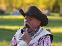 Cowboy eating Steak Dinner Stock Footage