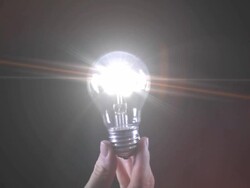 holding lightbulb Stock Footage