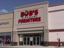 Bob's Discount Furniture store on Central Park Ave Stock Footage