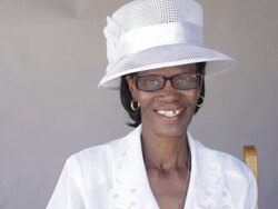 Stylish african senior smiling at the camera Stock Footage