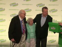 Eric Stonestreet (â€œModern Familyâ€) joins the famous Swiffer commercial couple Morty & Lee & poses for photographers at the Swiffer Effect event Stock Footage