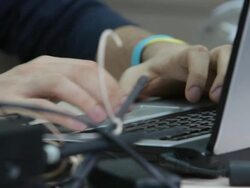 Reporter using keyboard at Donbass News in Donetsk Ukraine Stock Footage