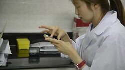 medical technician checking email with patient's lab results Stock Footage