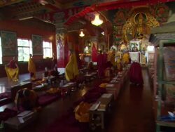 WS ZI Buddhist monks getting ready to leave building in Kopan monastery / Kathmandu, Central, Nepal Stock Footage