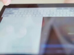 Collegian typing on digtal table Stock Footage