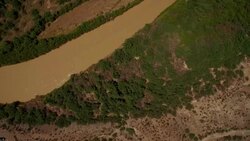 Fly above Rio Grande River from Big Bend National Park Texas looking at Mexico Stock Footage