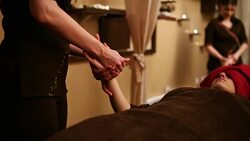 Towel covered guy with turban on  hand massage Stock Footage