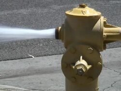 (HD1080i) Water Conservation: Hydrant Spraying Stock Footage