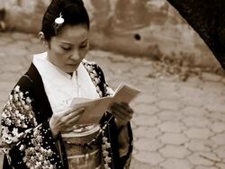 Japanese woman reading old letter Stock Footage
