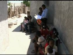 AP looks at efforts to reunite families after quake News Clip