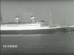 MOT 1933: NEW YORK, NEW YORK: WS Statue of Liberty w/ Hudson River FG. Two men taking tickets from man in ticket window. MS Steamship traveling on water. Refugee men being interviewed in salon by immigration inspectors in uniform. Instructional Video