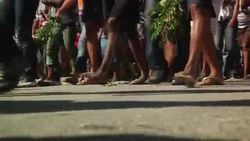 Hundreds demonstrate to demand rise in minimum wage News Clip