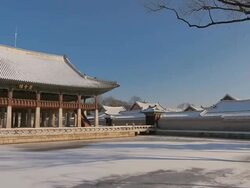 MS PAN Shot of Snow Scene of Gyeonghoeru pavilion in Gyeongbokgung Royal Palace / Seoul, South Korea Stock Footage