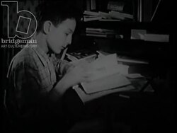 Montage of books, different lessons, and children in classrooms at the Lycee Henri IV in Paris, 1951 Stock Footage