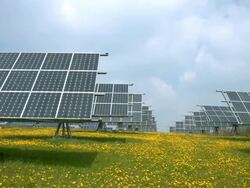 Solar Power Station in Spring PAN (4K/UHD to HD) Stock Footage