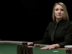 HD DOLLY: Female Card Dealer Stock Footage