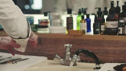 Barber washing his hands Stock Footage