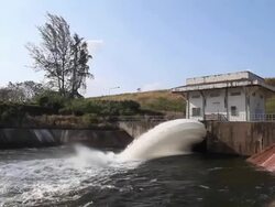 Watergate for blocking or draining a stream of water Stock Footage
