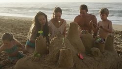 Family on a tropical beach vacation to Hawaii Stock Footage