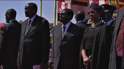 Mugabe and Tsvangirai at funeral of general Mujuru News Clip