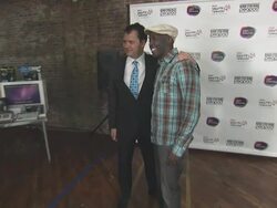 Philip Courtney and Michael K. Williams at the Black Eyed Peas at the Peapod Adobe Youth Voices Academy Launch Stock Footage