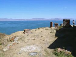 Hayravank monastery, Sevan lake, khachkars and view of the Sevan lake in the background Stock Footage