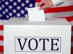 MS Hand Inserting ballot into ballot box in front of american flag / Seoul, South Korea Stock Footage