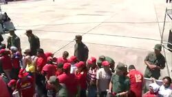 CLEAN : Crowds in red pack the streets News Clip