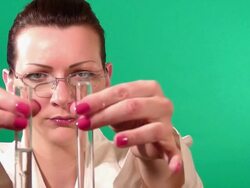 Lab worker checking test tube Stock Footage