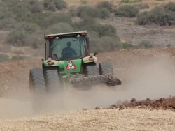 Tractor ploughing, Israel Stock Footage