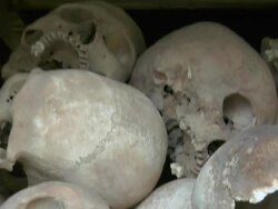 TU CU Human skulls displayed at Choeung Ek, a Killing Fields memorial / Phnom Penh, Cambodia Stock Footage