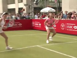 Jim Courier and Monica Seles play with anette Alderoty and Lynne Karinja Stock Footage