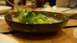 dinner time with green vegetable salad bowl Stock Footage