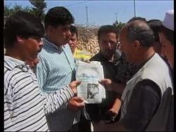 West Bank - Palestinians mourn for murdered Arab News Clip