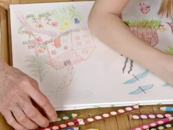 HD: Girl Drawing With Her Grandmother Stock Footage