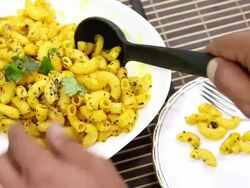 Serving Macaroni Pasta cooked in Desi Indian Style Stock Footage
