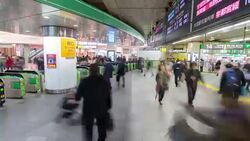 Time-lapse: Pedestrians crowded at Gate of Shinjuku station Tokyo Stock Footage